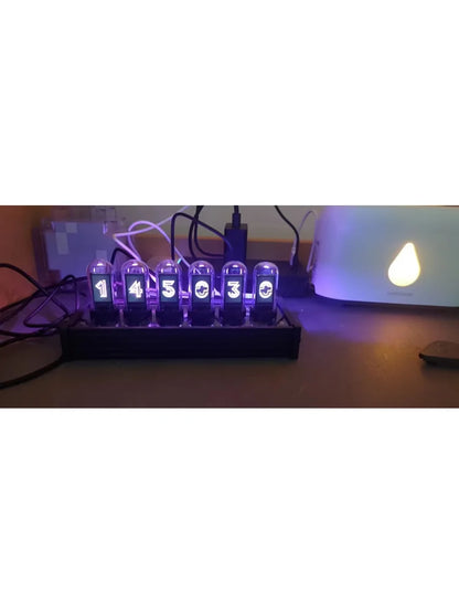 Very cool! IPS RGB Nixie Tube Clock.