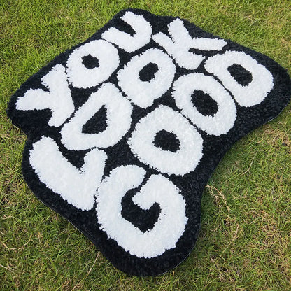 Tufted "You Look Good" Rugs.