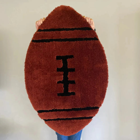 Beyond Deco Hand Tufted Football Area Rugs.